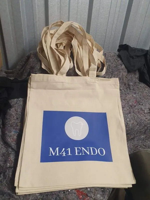 Custom printed tote bags with a company logo